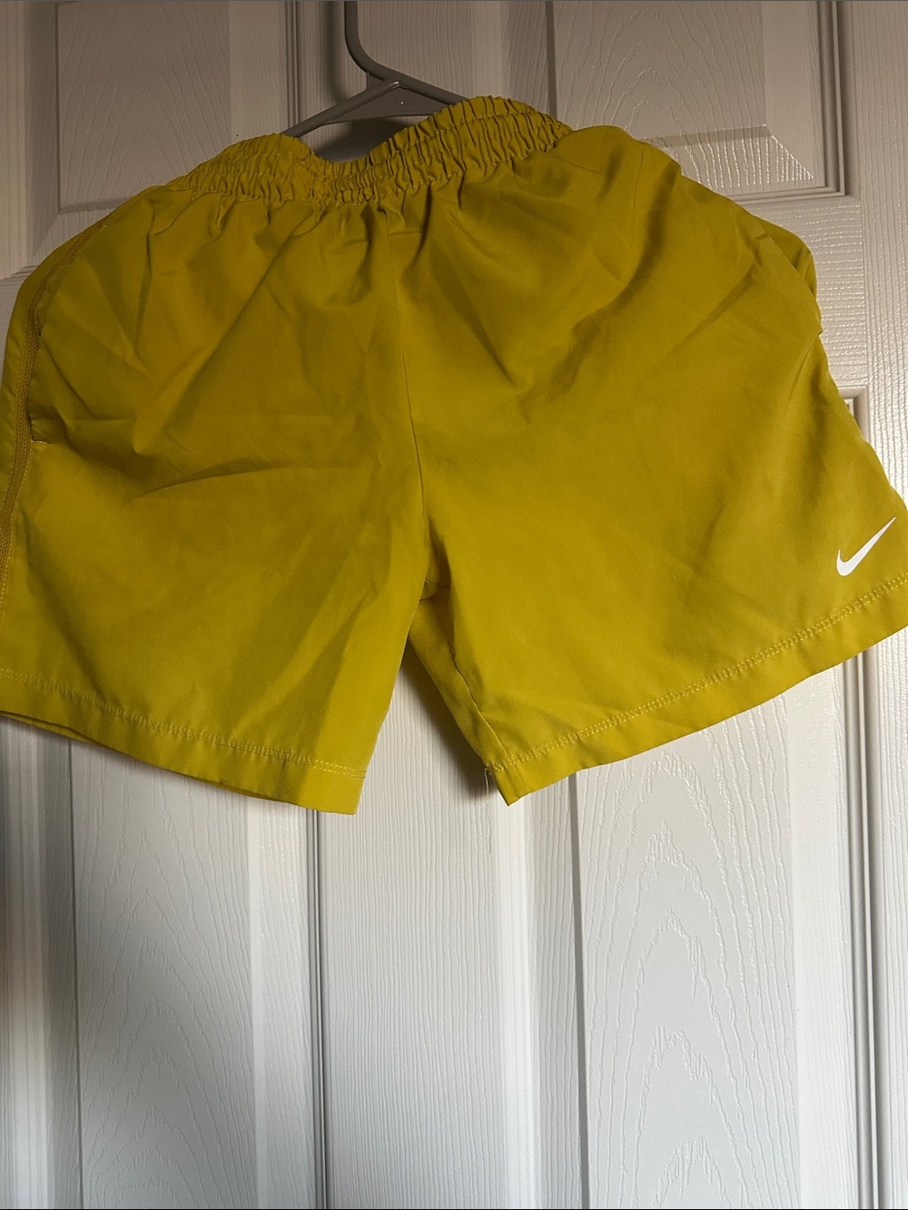 Nike Kid’s Yellow Athletic Shorts with dry fit material